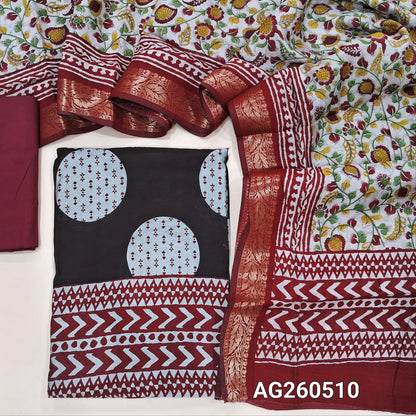 Black base soft silk cotton unstitched salwar material,polka design, printed all over,(lining needed)reddish maroon cotton bottom,floral printed silk cotton dupatta with borders and pallu. AG260510