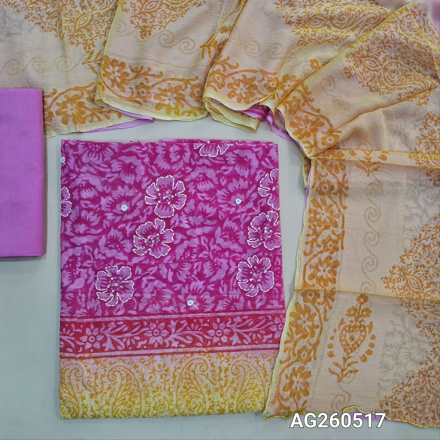 Pastel yellow & pink hand block printed premium kota unstitched salwar material, mirror & floral printed with hand embroidery work on yoke,(Lining Needed)cotton bottom,dual shaded hand block printed chiffon dupatta. AG260517