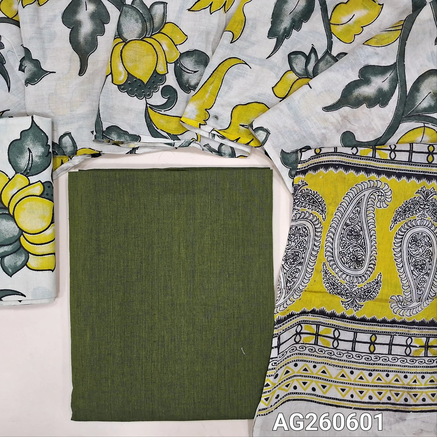 Leafy green handloom cotton unstitched salwar material,(lining optional)off white kalamkari hand block printed cotton bottom,kalamkari hand block printed mul cotton dupatta with contrast pallu. AG260601