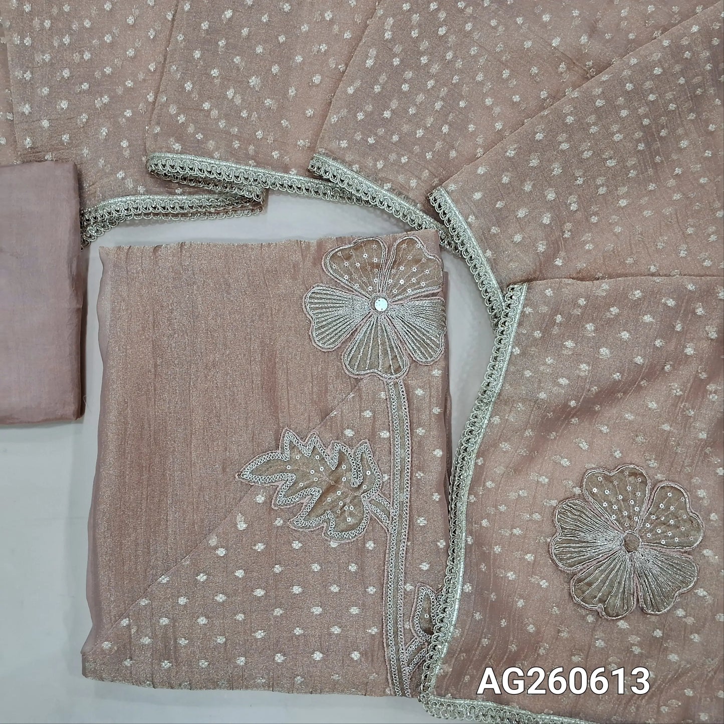 Light peachish pink with golden tint crinkled tissue organza unstitched salwar material,applique with zari and sequins on daman,(thin, lining needed)silky bottom,benarasi zari woven and applique work on tissue organza dupatta with lace tapping. AG260613