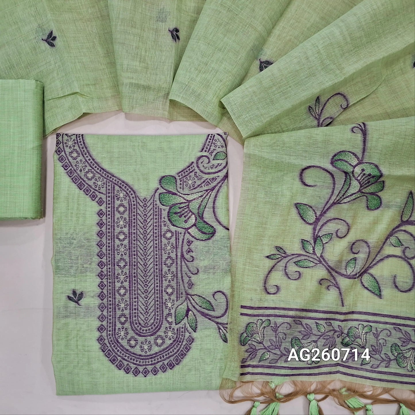 Light green jamdani woven silk cotton unstitched salwar material, heavy jamdani woven on yoke & front,(thin, lining needed) matching silk cotton bottom, jamdani woven silk cotton full length dupatta with handmade tassels. AG260714
