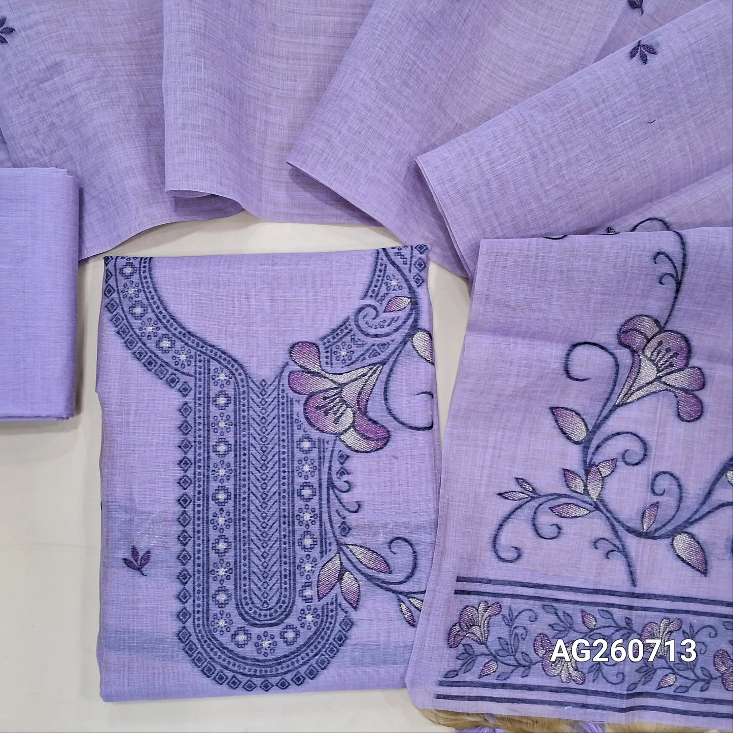 Lavender jamdani woven silk cotton unstitched salwar material, heavy jamdani woven on yoke & front,(thin, lining needed) matching silk cotton bottom, jamdani woven silk cotton full length dupatta with handmade tassels. AG260713