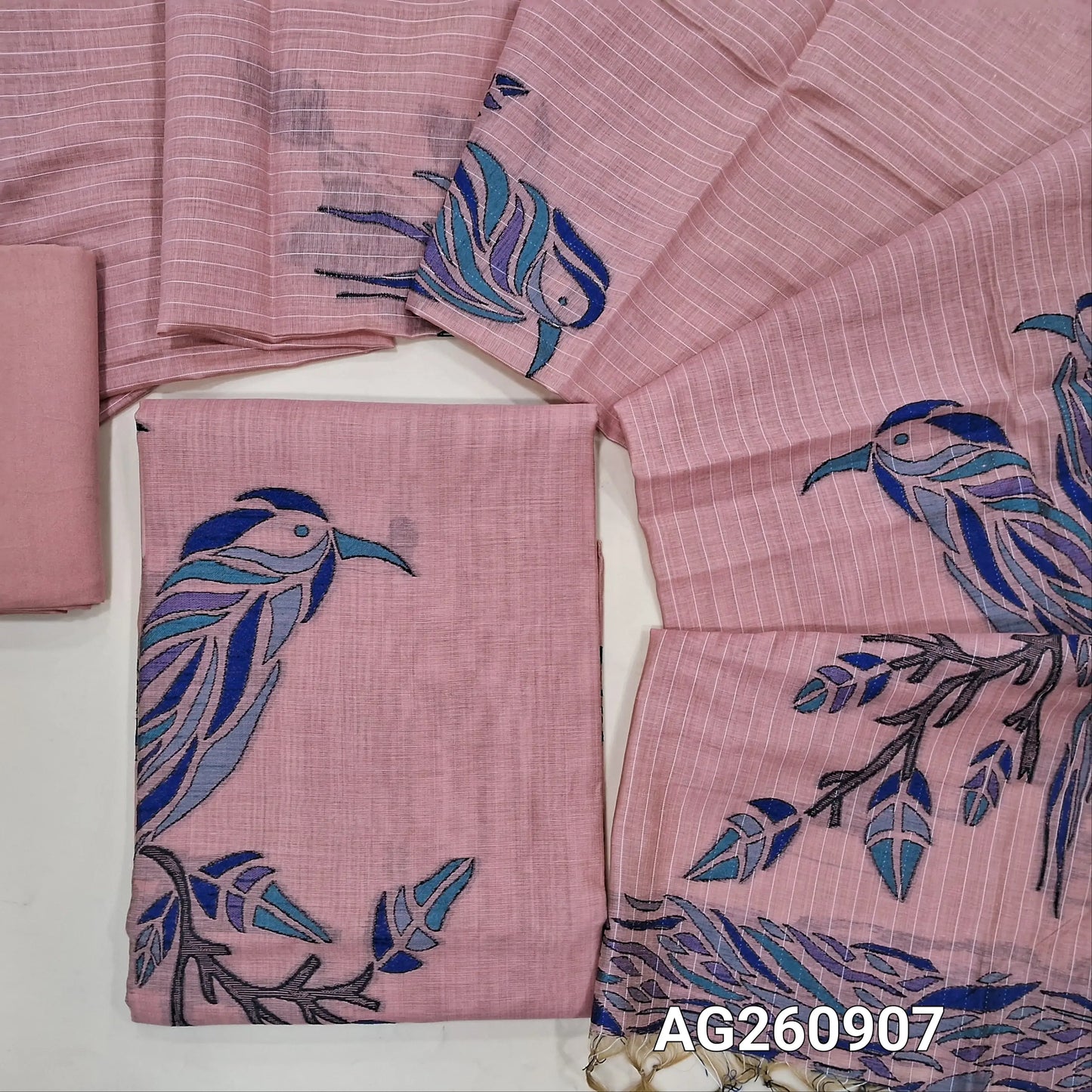 Pastel pink silk cotton unstitched salwar material,buttas all over, bird weaving on daman,(Lining Needed)santoon bottom,thread woven lines & weaving design on full length silk cotton dupatta with tassles . AG260907