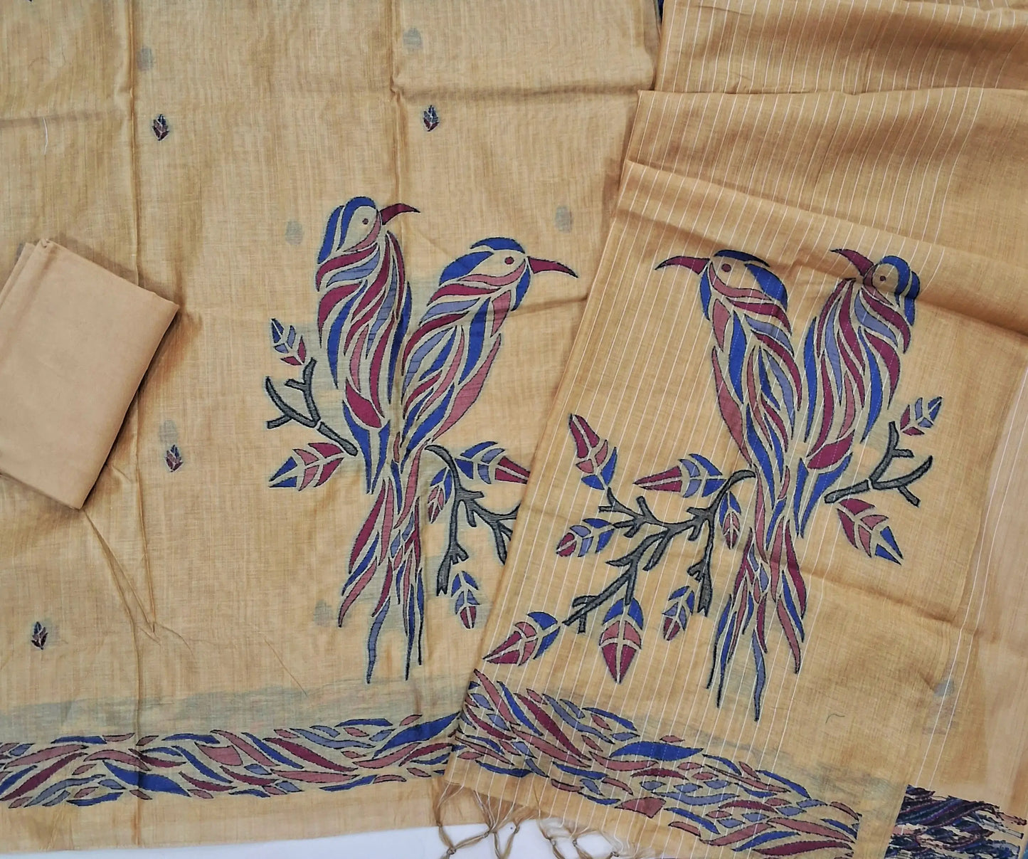 Rich beige silk cotton unstitched salwar material,buttas all over, bird weaving on daman,(Lining Needed)santoon bottom,thread woven lines & weaving design on full length silk cotton dupatta with tassles . AG260909