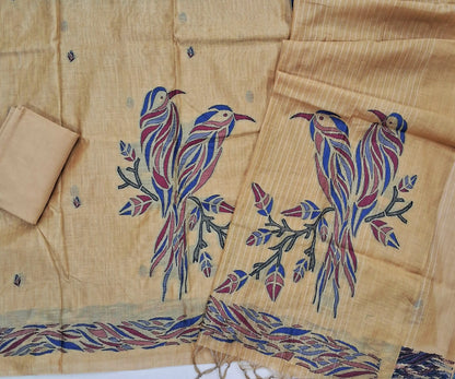 Rich beige silk cotton unstitched salwar material,buttas all over, bird weaving on daman,(Lining Needed)santoon bottom,thread woven lines & weaving design on full length silk cotton dupatta with tassles . AG260909