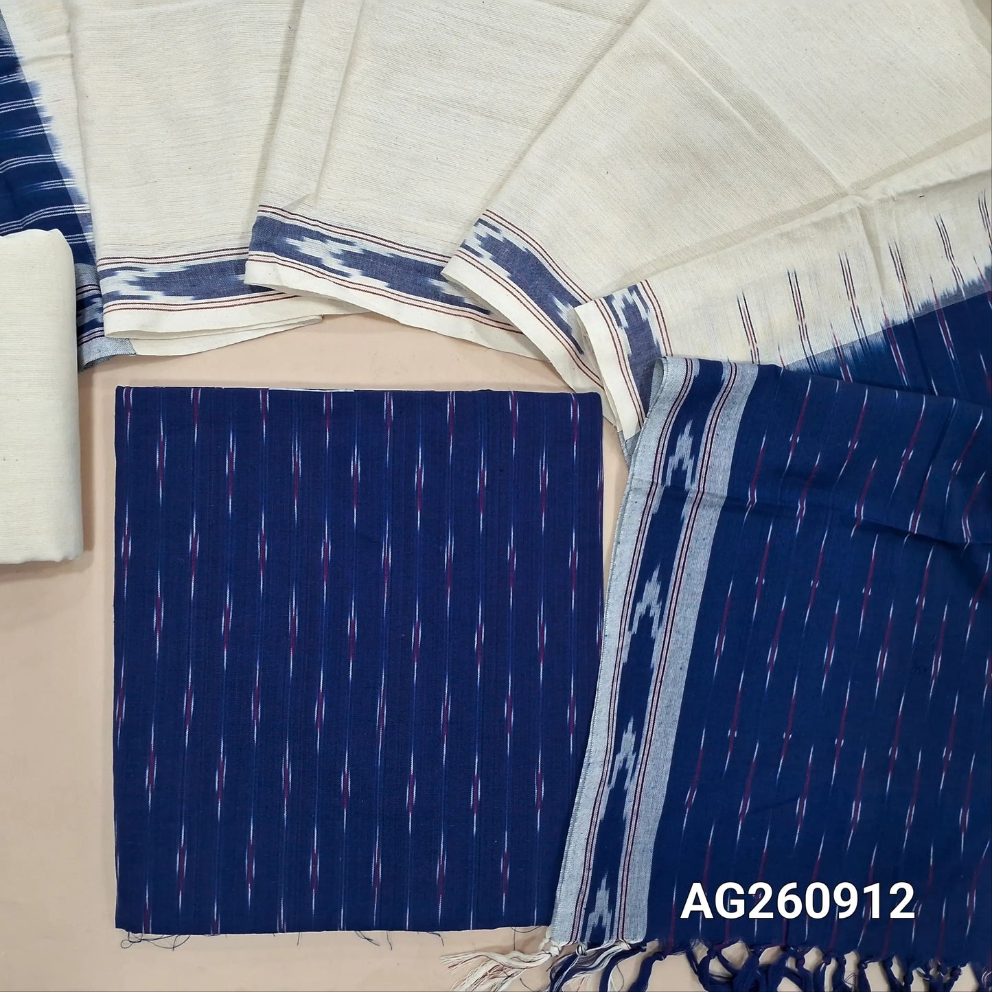 Royal blue premium ikat woven handloom cotton unstitched salwar material, (lining optional)off white cotton bottom, dual shaded handloom cotton dupatta with borders and tassles. AG260912
