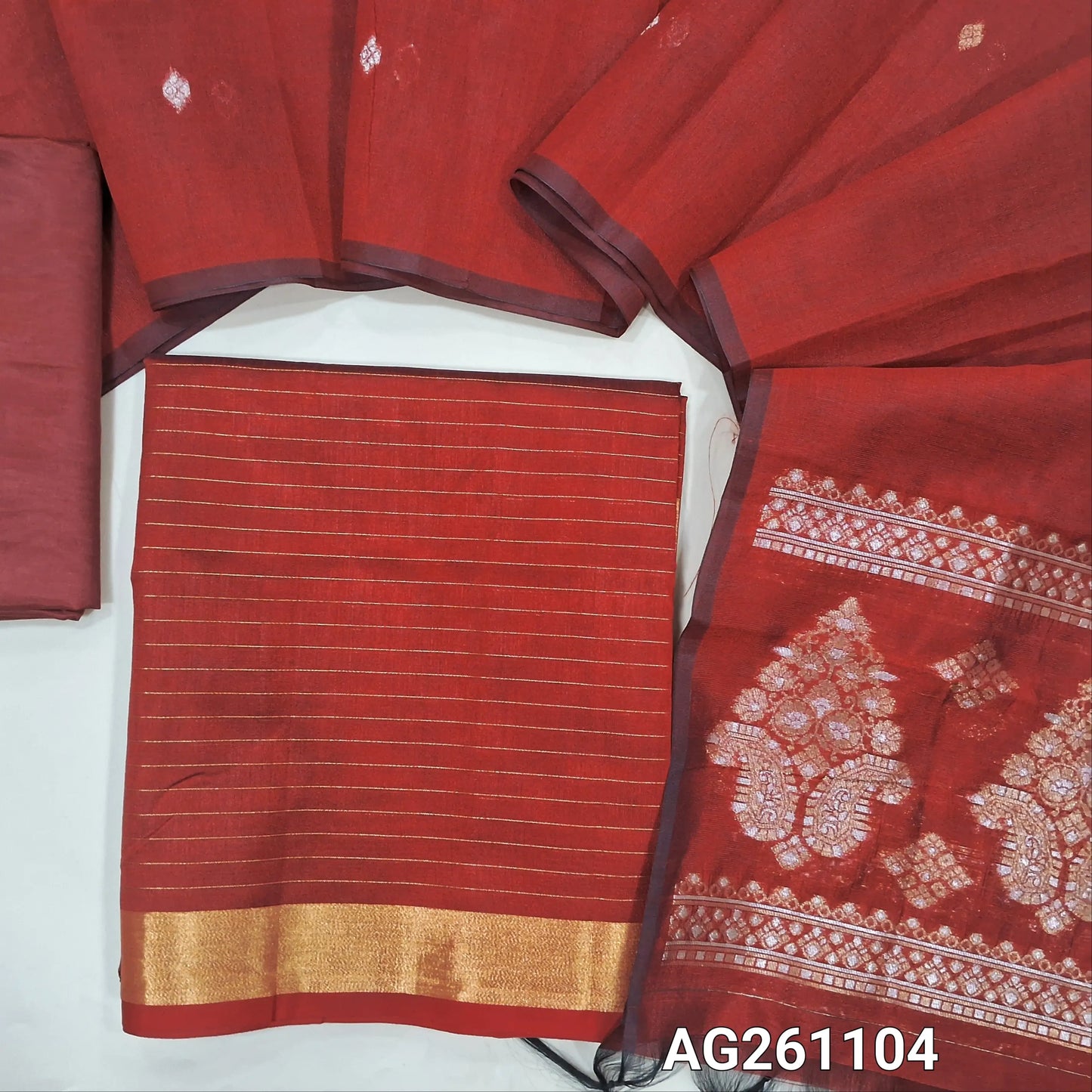 Reddish maroon silk cotton unstitched salwar material,zari lines all over,(Lining Needed)silky bottom, benarsi zari woven on full length silk cotton dupatta with rich gold and silver zari pallu. AG261104