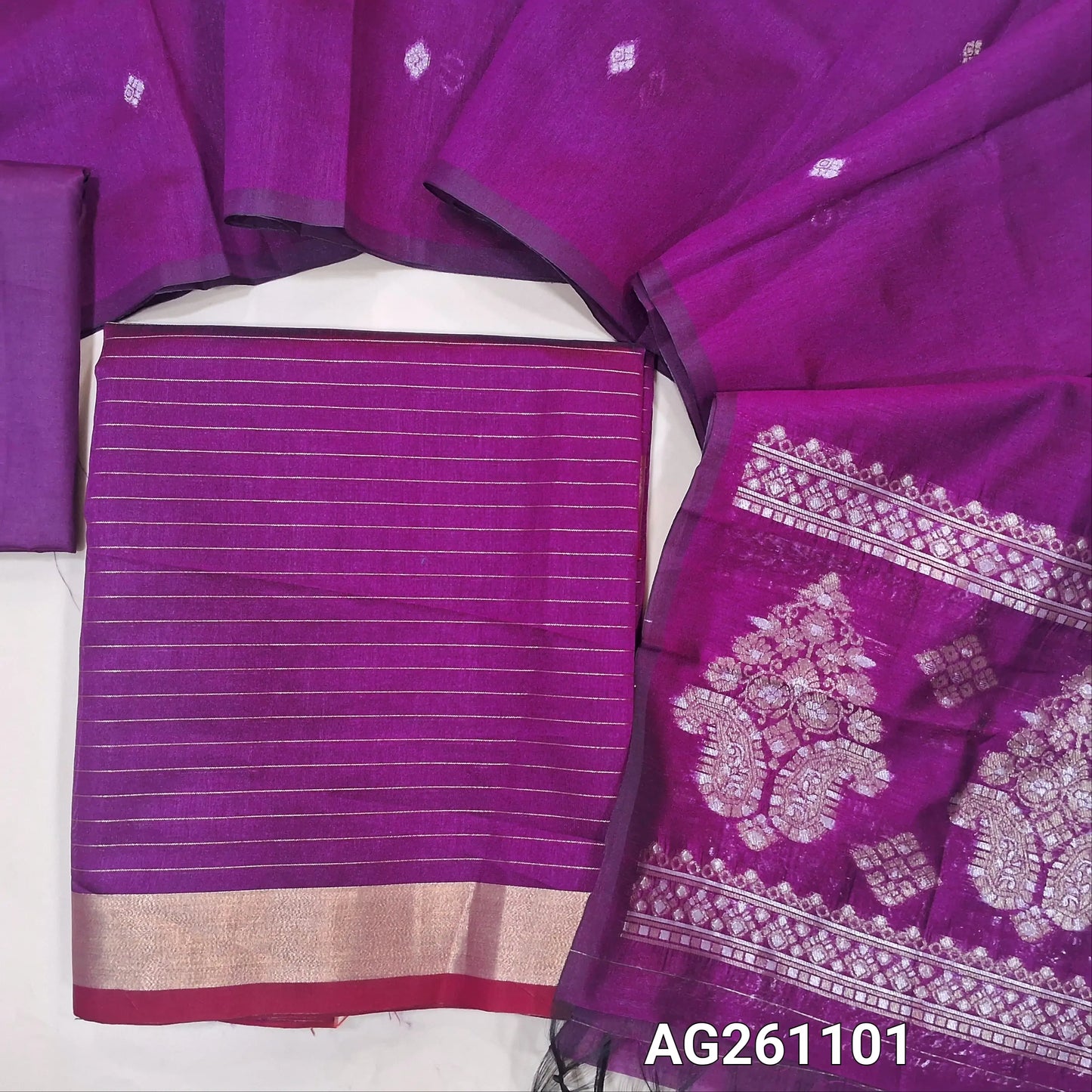 Purple silk cotton unstitched salwar material,zari lines all over,(Lining Needed)silky bottom, benarsi zari woven on full length silk cotton dupatta with rich gold and silver zari pallu. AG261101