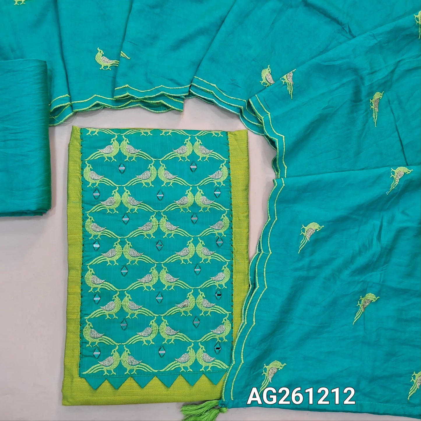 Green raw silk unstitched salwar material,contrast yoke patch with bird embroidery and real mirror(lining optional)blue silky bottom, bird embroidery on silk cotton dupatta with scallop borders. AG261212