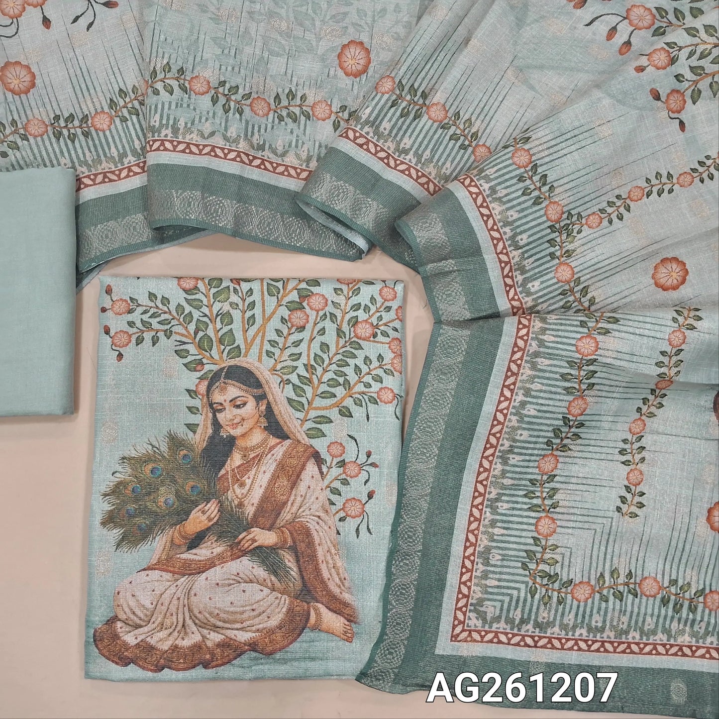 Pastel blue with golden tint tissue silk cotton unstitched salwar material,zari buttas all over,digital printed daman, (lining needed)santoon bottom, zari buttas and digital printed tissue silk cotton dupatta with zari woven borders. AG261207