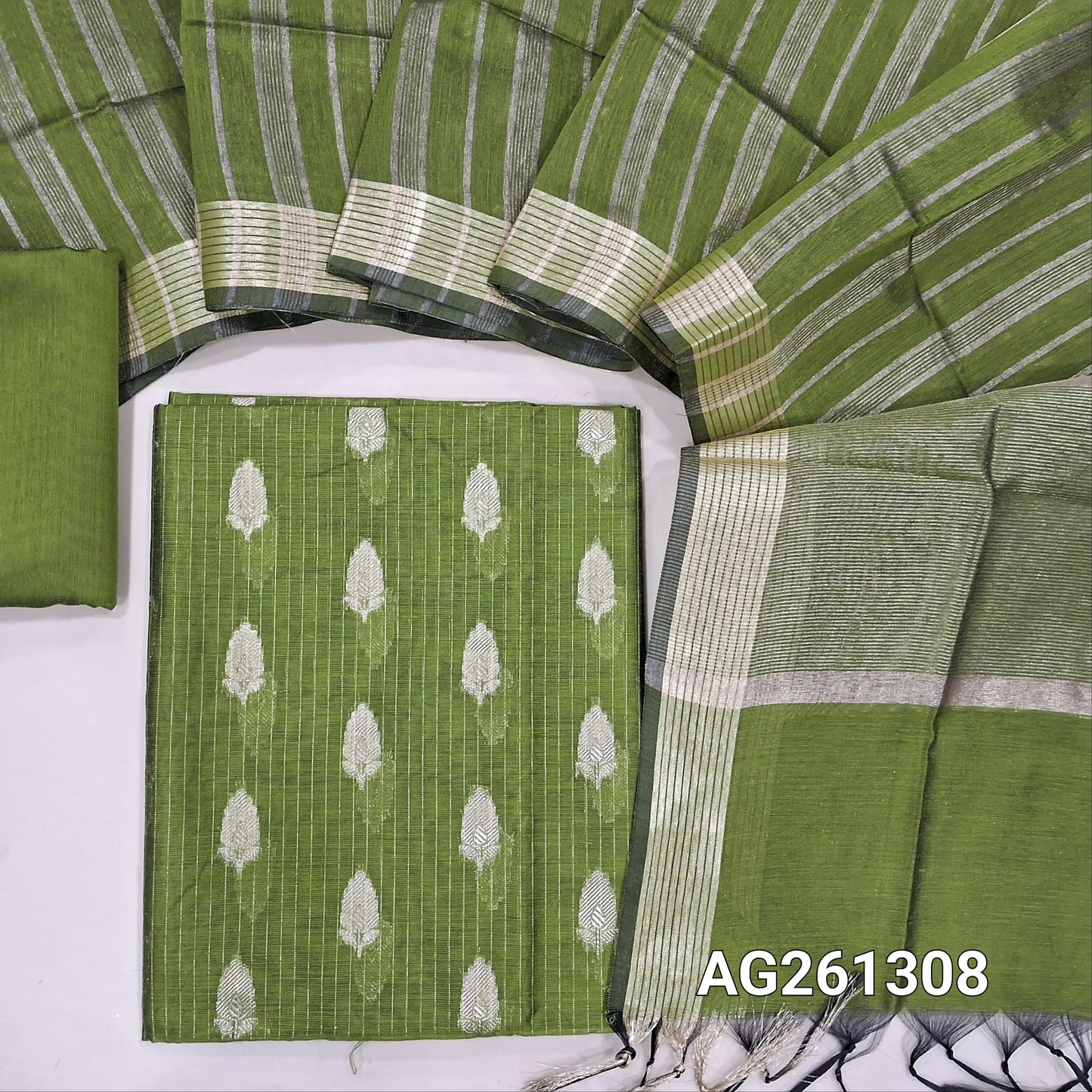 Green benarasi silk cotton unstitched salwar material,zari woven buttas and zari lines all over,gold tissue daman,(Lining Needed)silk cotton bottom, gold tissue lines on tissue silk cotton dupatta with borders. AG261308