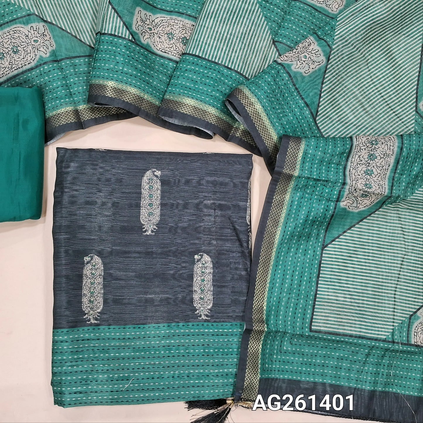 Black jute silk unstitched salwar material, digital printed with sequins work on front, (textured, lining needed)turquoise green silky bottom,digital printed jute silk dupatta with zari woven borders. AG261401