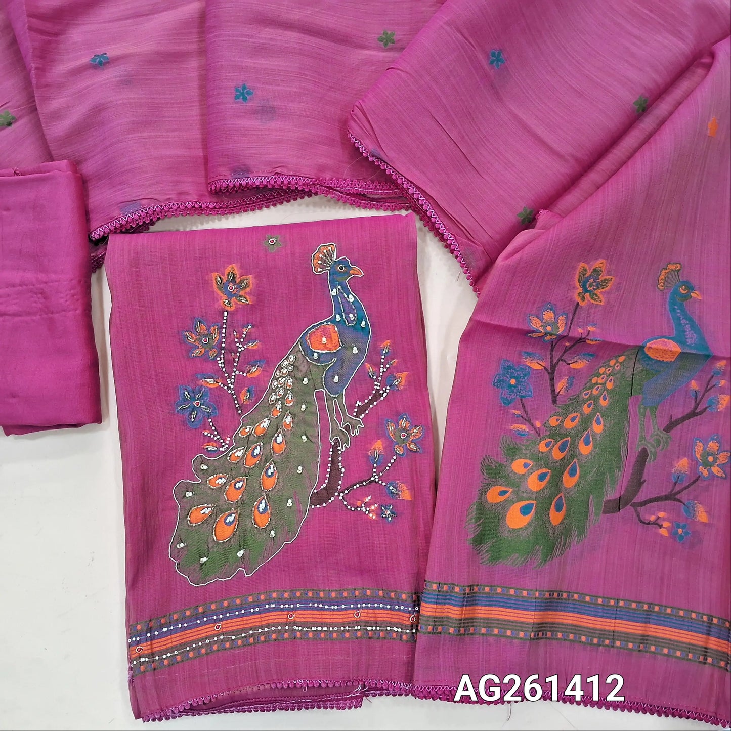 Pink premium silk cotton unstitched salwar material,(thin, lining needed)weaving yoke with bead detailing, buttas all over,weaving design with zardozi and bead on daman, santoon bottom,thread weaving on premium silk cotton dupatta with tapping. AG261412