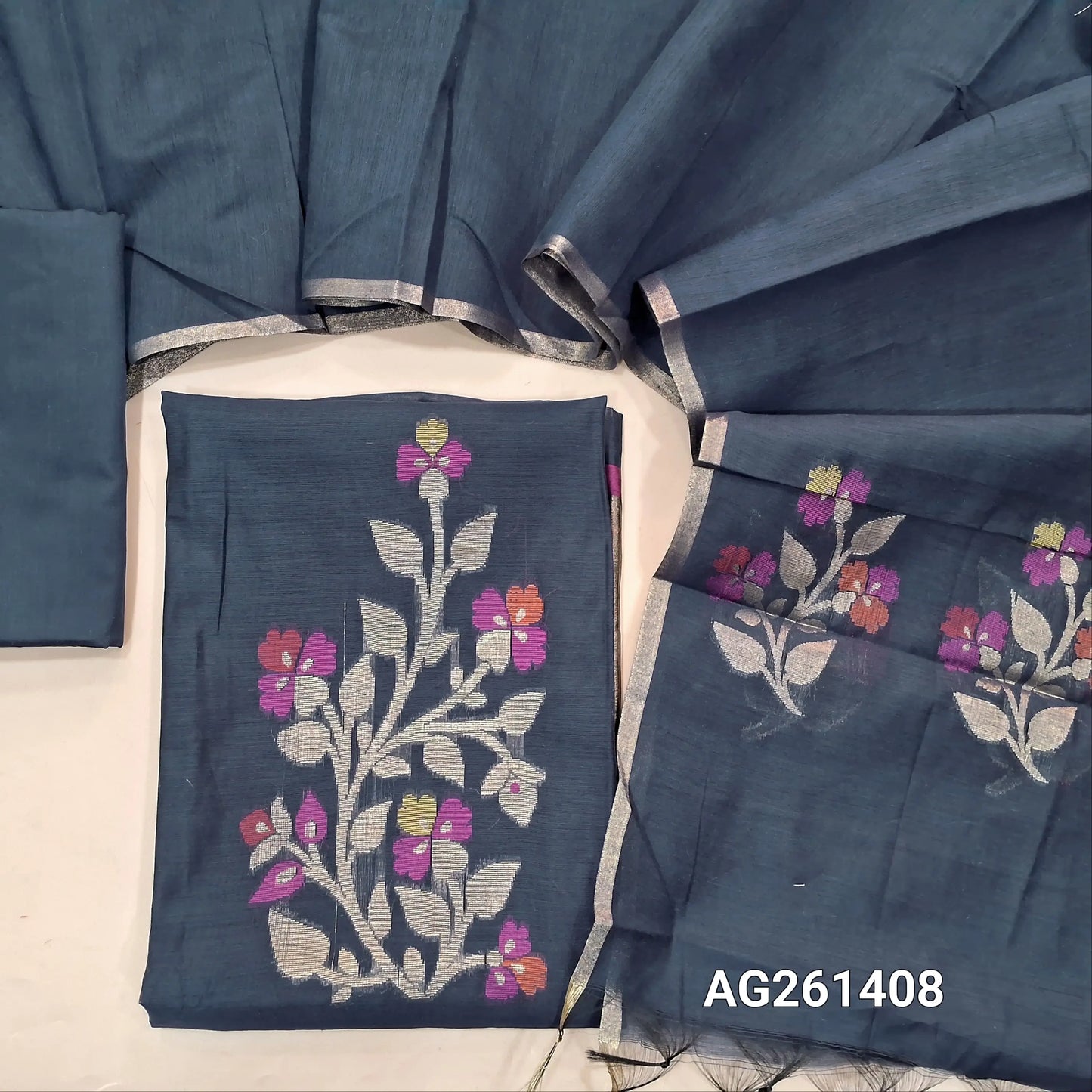Dark blue silk cotton unstitched salwar material,zari and meenakari weaving on front,gold tissue daman,(Lining Needed)silk cotton bottom, silk cotton dupatta with weaving pallu. AG261408