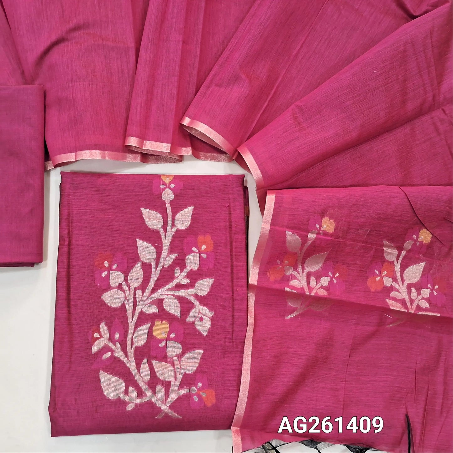 Rani pink silk cotton unstitched salwar material,zari and meenakari weaving on front,gold tissue daman,(Lining Needed)silk cotton bottom, silk cotton dupatta with weaving pallu. AG261409
