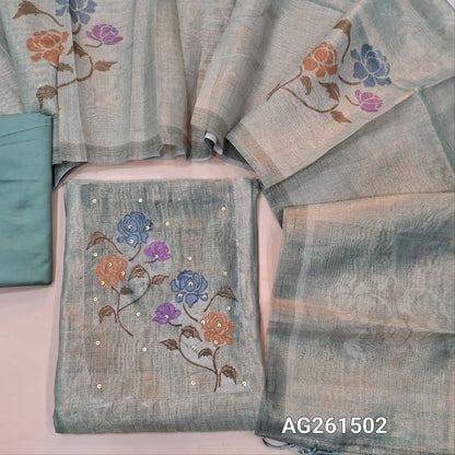 Green with golden tint Tissue silk unstitched salwar material, embroidery and sequins work on yoke,(lining needed)silky bottom,digital printed on metallic tissue silk dupatta with fancy tassles. AG261502