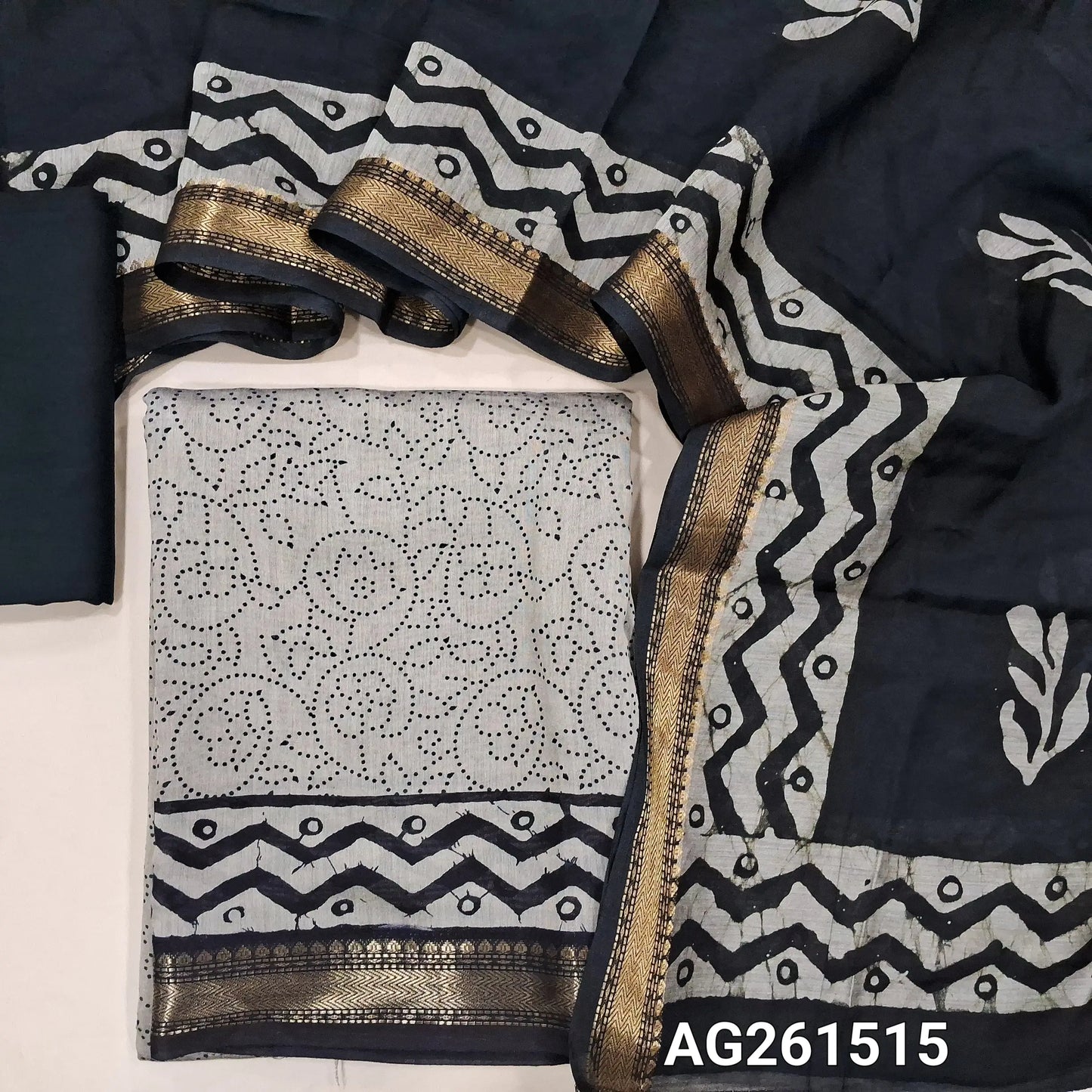 Beige printed soft silk cotton unstitched salwar material,zari borders daman,(Lining Needed)spun cotton bottom,printed full length soft silk cotton dupatta with borders(TAPPING NEEDED). AG261515