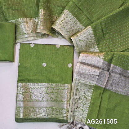 Leafy green benarasi silk cotton unstitched salwar material,checked design on yoke,buttas on front,antic gold zari weaving daman,(Lining Needed)silk cotton bottom,zari lines on silk cotton dupatta with tissue pallu and borders. AG261505