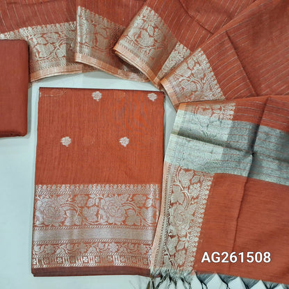 Rust orange benarasi silk cotton unstitched salwar material,checked design on yoke,buttas on front,antic gold zari weaving daman,(Lining Needed)silk cotton bottom,zari lines on silk cotton dupatta with tissue pallu and borders. AG261508