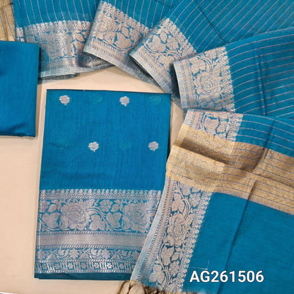 Turquoise blue benarasi silk cotton unstitched salwar material,checked design on yoke,buttas on front,antic gold zari weaving daman,(Lining Needed)silk cotton bottom,zari lines on silk cotton dupatta with tissue pallu and borders. AG261506