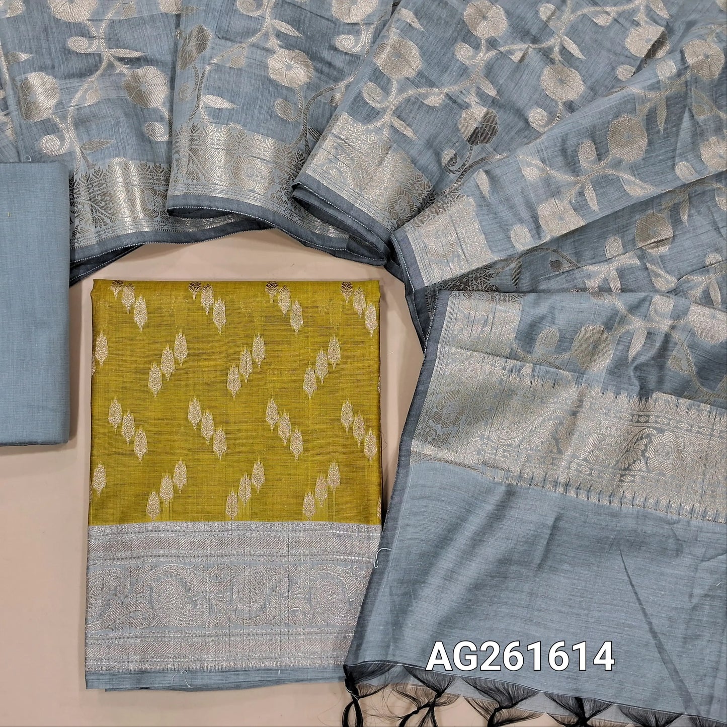 Mehandhi yellow benarasi silk cotton unstitched salwar material, zari buttas all over,antic gold zari weaving on daman,(Lining needed)silver grey silk cototn bottom, benarasi zari woven silk cotton dupatta with borders. AG261614