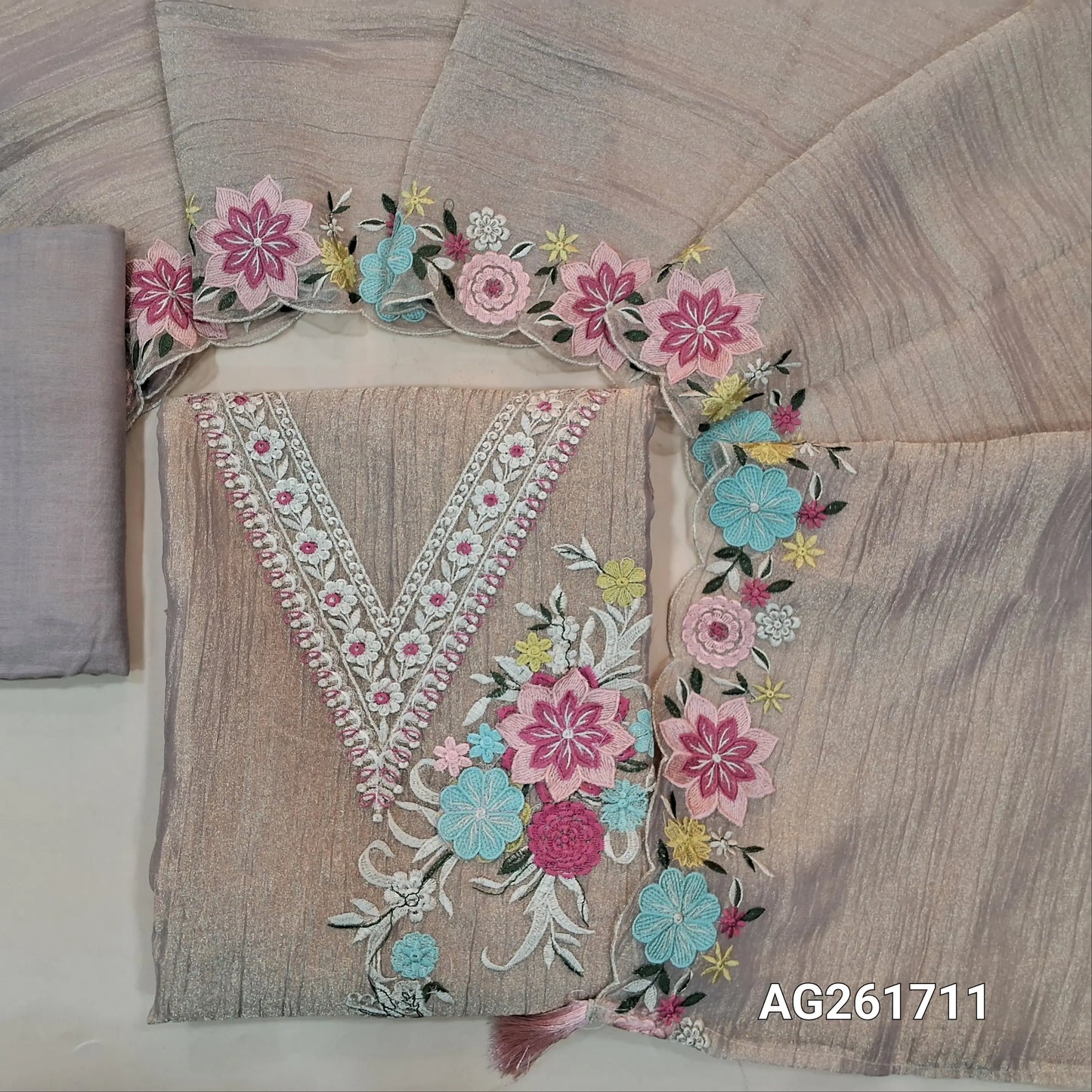 Pink with golden tint crinkled tissue organza silk unstitched salwar material, v neck with 3D thread embroidery yoke,embroidery work on front(lining needed)santoon bottom, crinkled tissue organza silk dupatta with embroidered scallop borders. AG261711