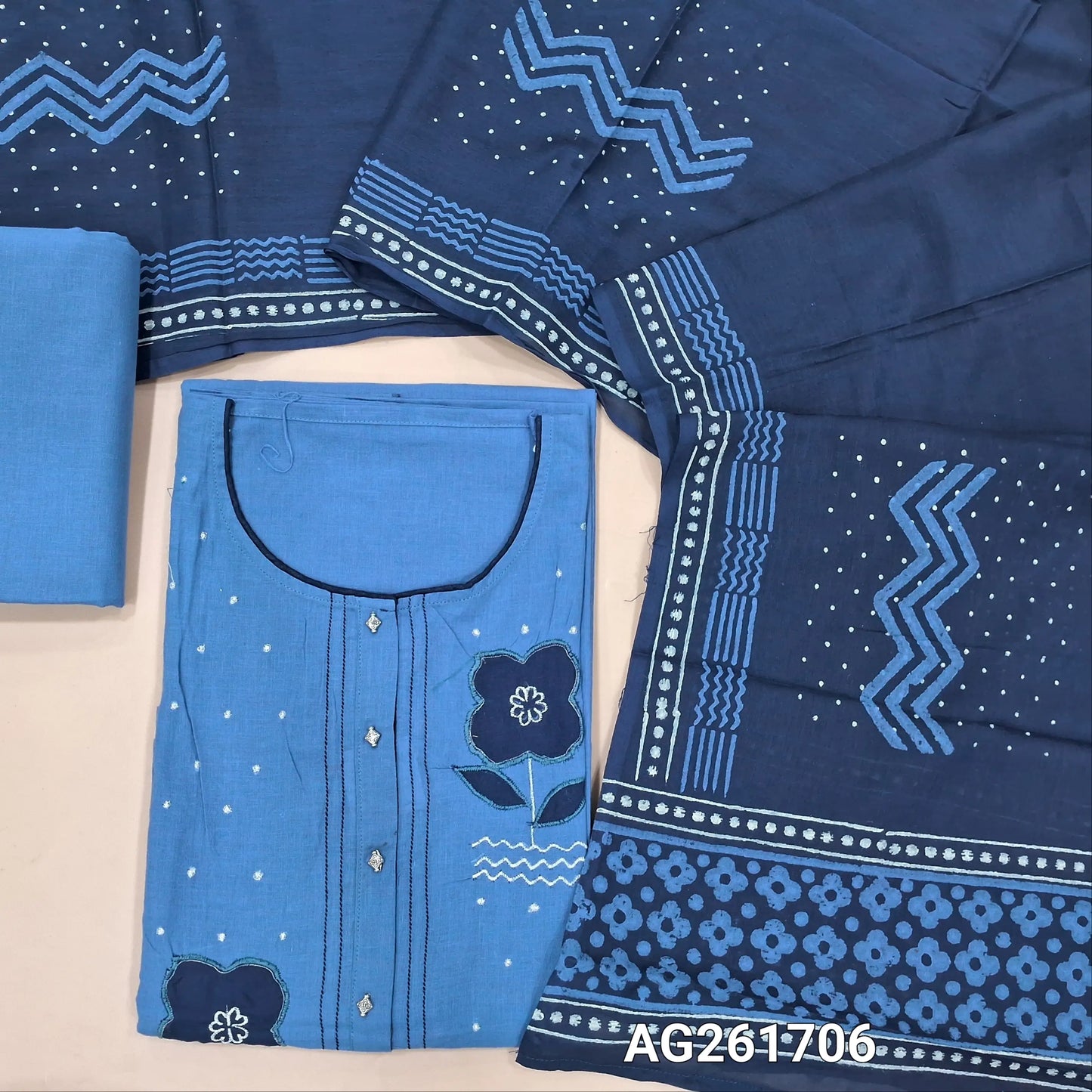 Powder blue mercerized handloom cotton unstitched salwar material,floral applique work on yoke,(lining needed)cotton bottom,hand block printed mul cotton dupatta. AG261706