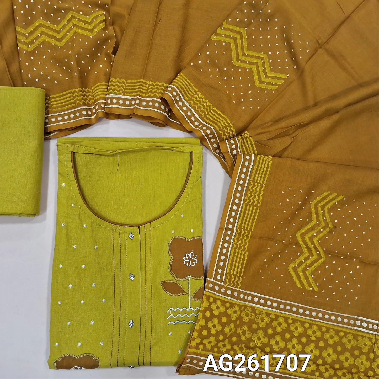 Mehandhi yellow mercerized handloom cotton unstitched salwar material,floral applique work on yoke,(lining needed)cotton bottom,hand block printed mul cotton dupatta. AG261707