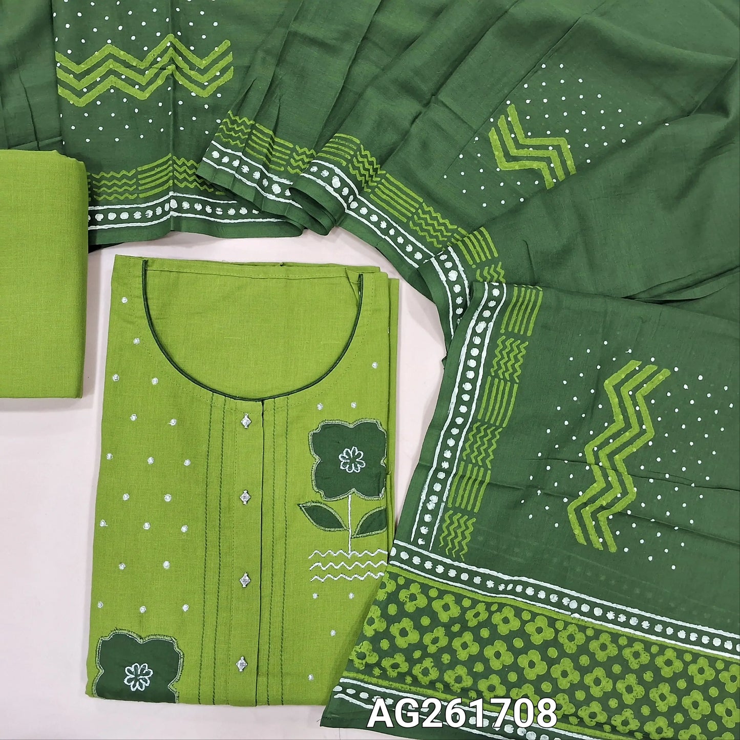 Green mercerized handloom cotton unstitched salwar material,floral applique work on yoke,(lining needed)cotton bottom,hand block printed mul cotton dupatta. AG261708