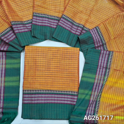 Yellow mercerized handloom cotton unstitched salwar material(thin, lining needed) checked all over with contrast traditional thread woven border, bottom included with top, checked mercerized handloom cotton dupatta with borders and tassels. AG261717