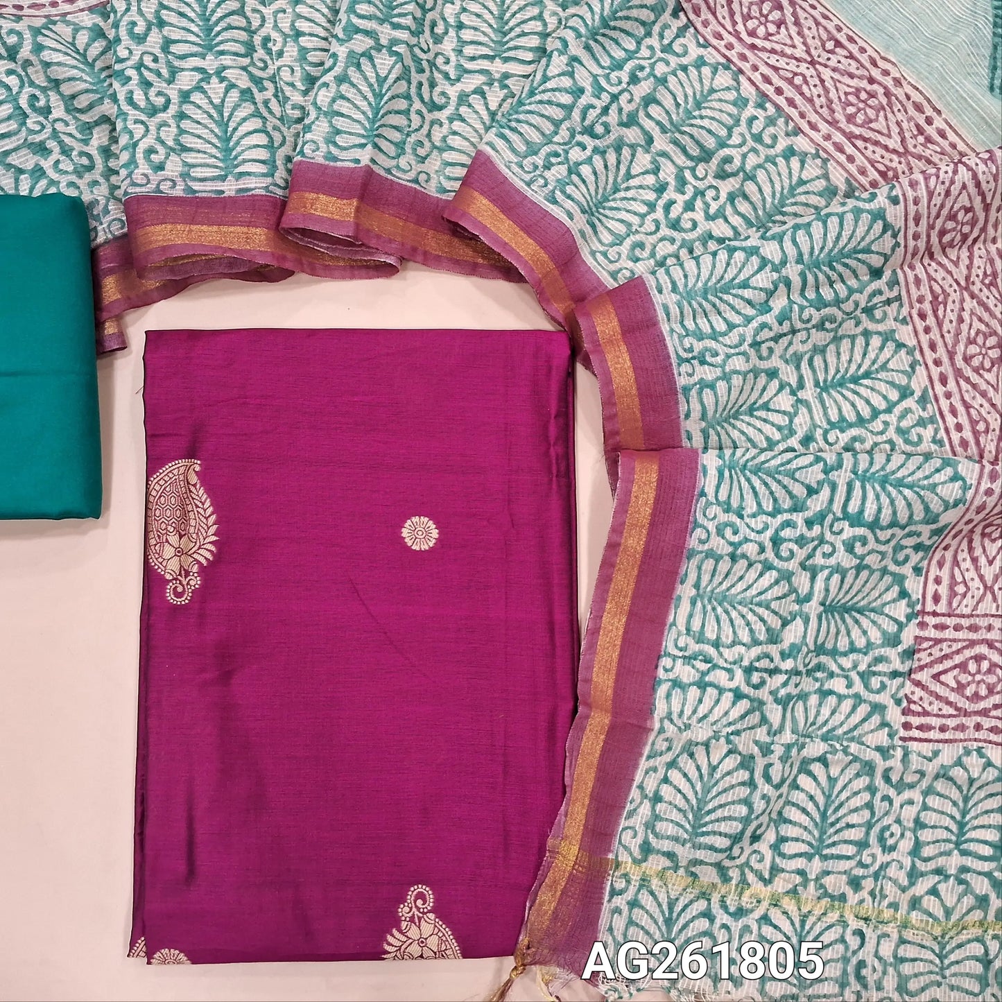 Pink benarasi silk cotton unstitched salwar material, thread woven buttas all over(Lining needed)turquoise green spun cotton bottom,hand block printed pure kota cotton dupatta with tissue borders. AG261805