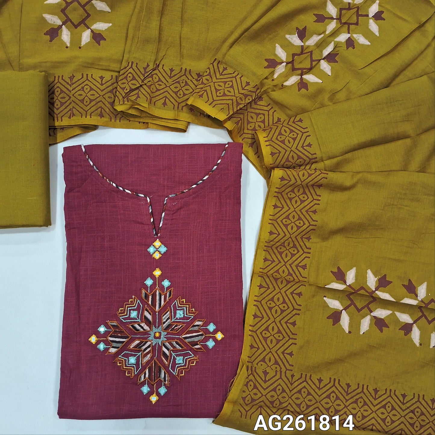 Dark pink premium slub cotton unstitched salwar material, applique and faux mirror on yoke( soft,lining needed)mehandhi yellow cotton bottom,premium hand block printed mul cotton dupatta. AG261814