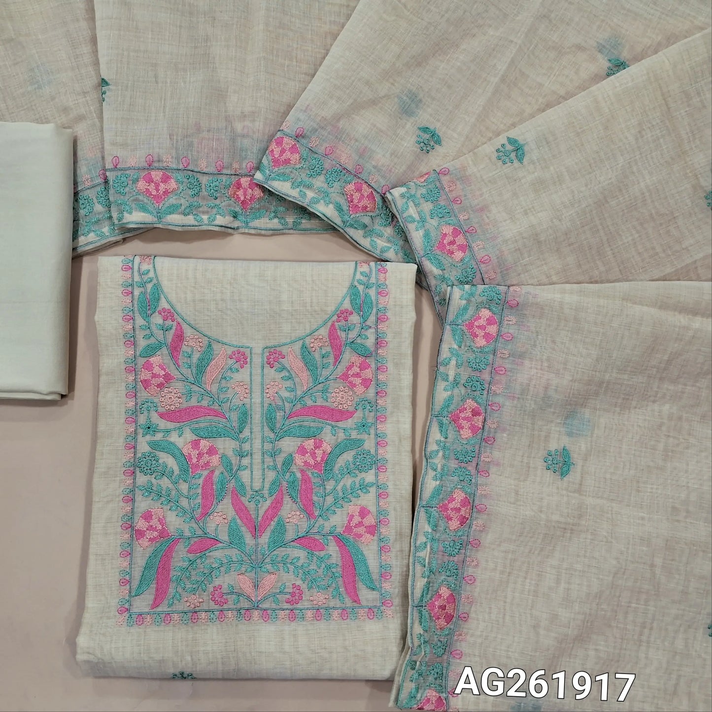 Light beige soft silk cotton unstitched salwar material,embroidery work on yoke(soft, lining needed)spun cotton bottom, embroidery work on silk cotton dupatta with borders. AG261917