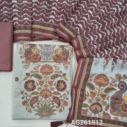 Beige semi jute silk cotton unstitched salwar material, digital printed with sequins work on daman,( lining needed)onion pink silky bottom,zig zag printed semi jute silk cotton dupatta with kalamkari pallu. AG261912