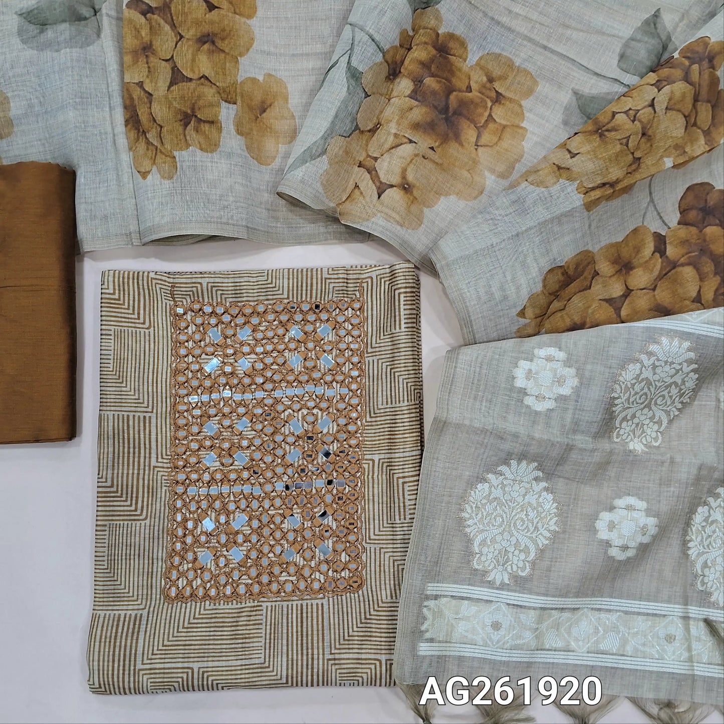 Beige base abstract printed premium silk cotton unstitched salwar material, real mirror on yoke, (soft, lining needed)mehandhi yellow silk cotton bottom,digital printed on silk cotton dupatta with jamdani woven pallu. AG261920
