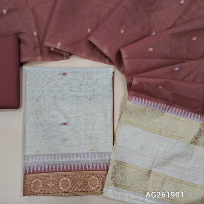 Off white silk cotton unstitched salwar material,contrast yoke with zari weaving border, gap border on daman,(Lining Needed)maroon spun cotton bottom, silk cotton dupatta with contrast pallu with gap borders. AG261901