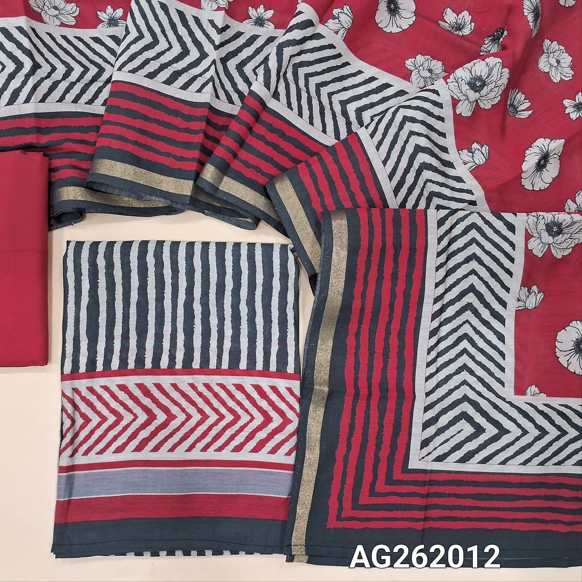 Black base soft silk cotton unstitched salwar material, vertical printed all over,(lining needed)dark pink cotton bottom,digital printed silk cotton dupatta with tissue borders. AG262010
