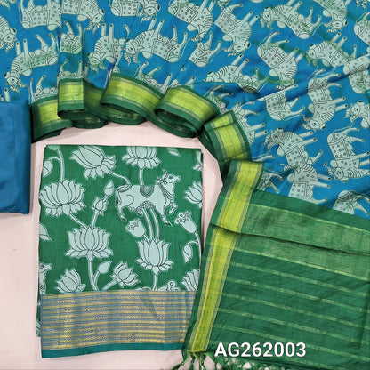 Turquoise green premium silk unstitched salwar material, pichwai printed all over,(silky,lining needed)royal blue silky bottom, dual shaded pichwai printed premium silk dupatta with contrast pallu and tassles. AG262003