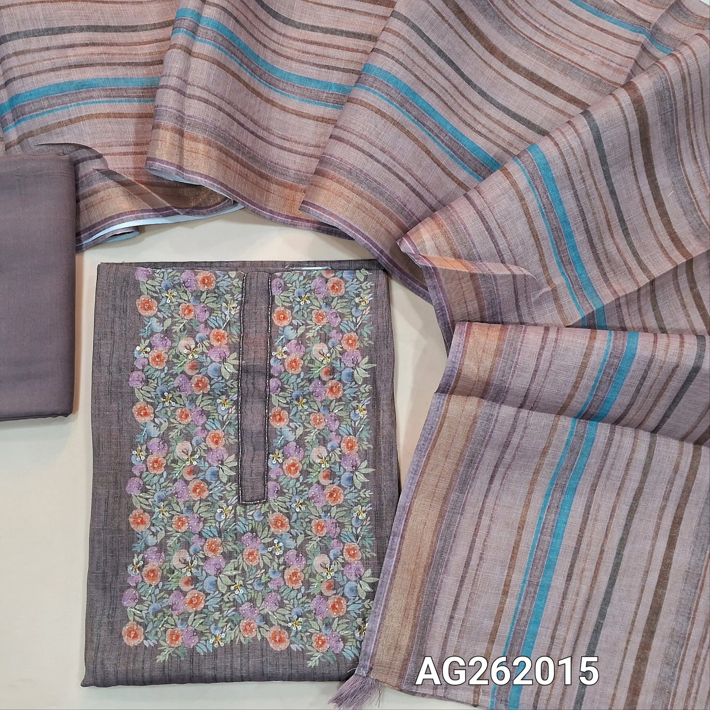 Mauve with golden tint tissue linen unstitched salwar material, floral printed with cut bead & sugar bead on yoke,(lining needed) spun cotton bottom,vertical printed tissue linen dupatta with tissue borders. AG262015
