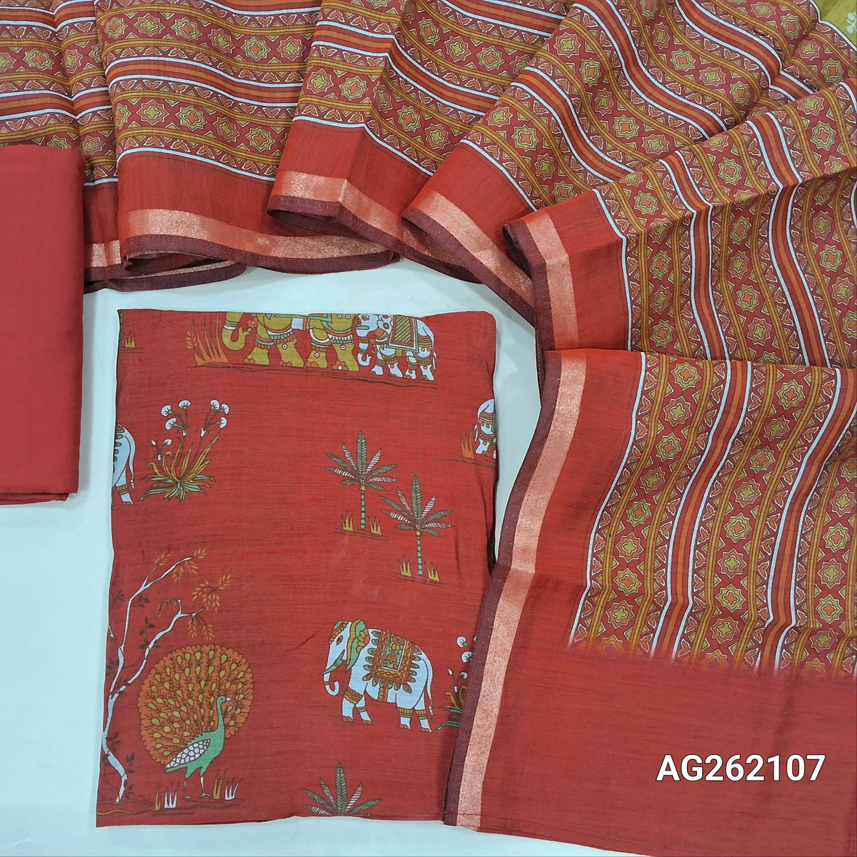 Rust orange soft silk cotton unstitched salwar material, digital printed all over(lining needed) cotton bottom,printed full length soft silk cotton dupatta with tissue borders. AG262107
