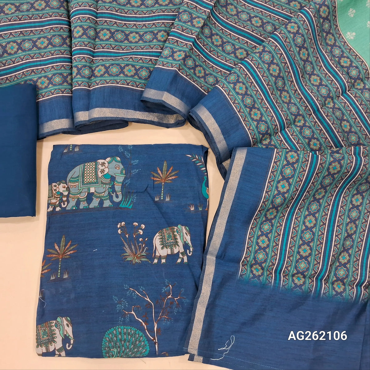Dark blue soft silk cotton unstitched salwar material, digital printed all over(lining needed) cotton bottom,printed full length soft silk cotton dupatta with tissue borders. AG262106