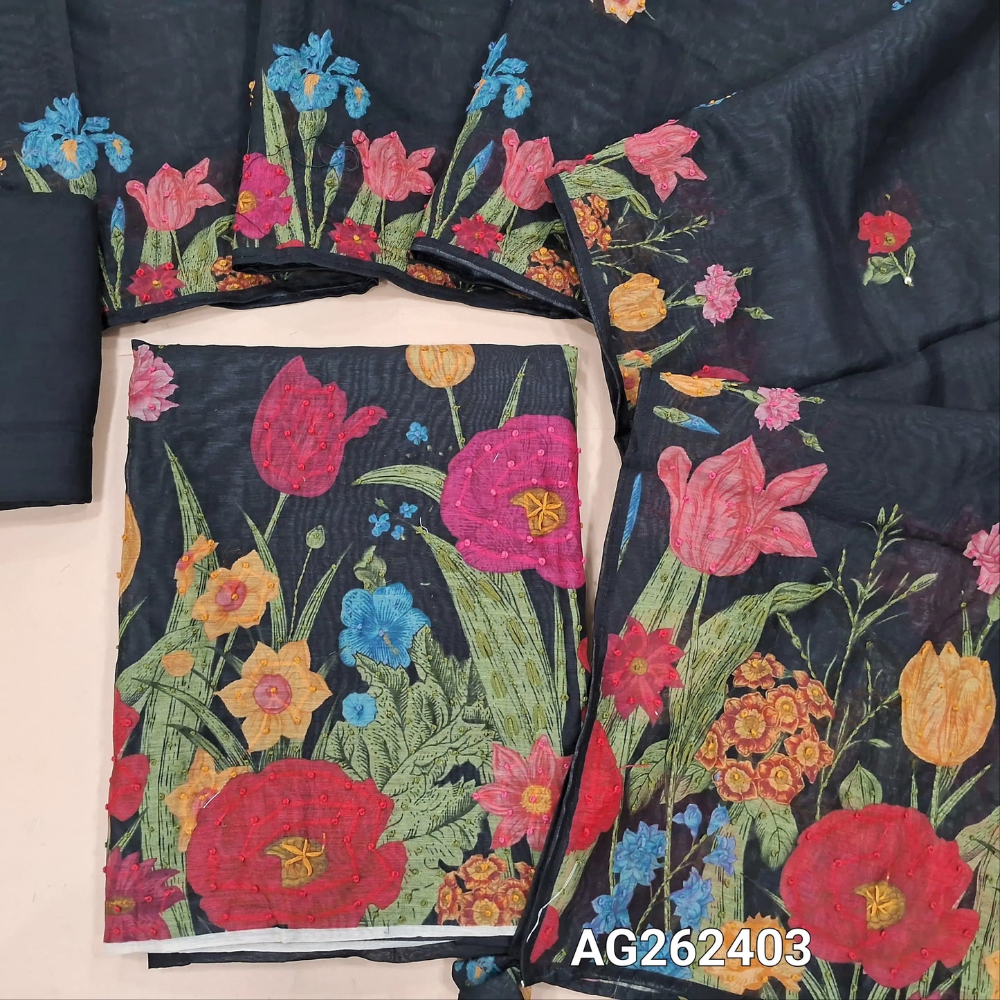 Black premium digital printed silk cotton unstitched salwar material with rich hand embroidery on yoke and daman (Thin, Lining Needed) Matching santoon bottom, digital printed silk cotton dupatta with hand embroidery work. AG262403