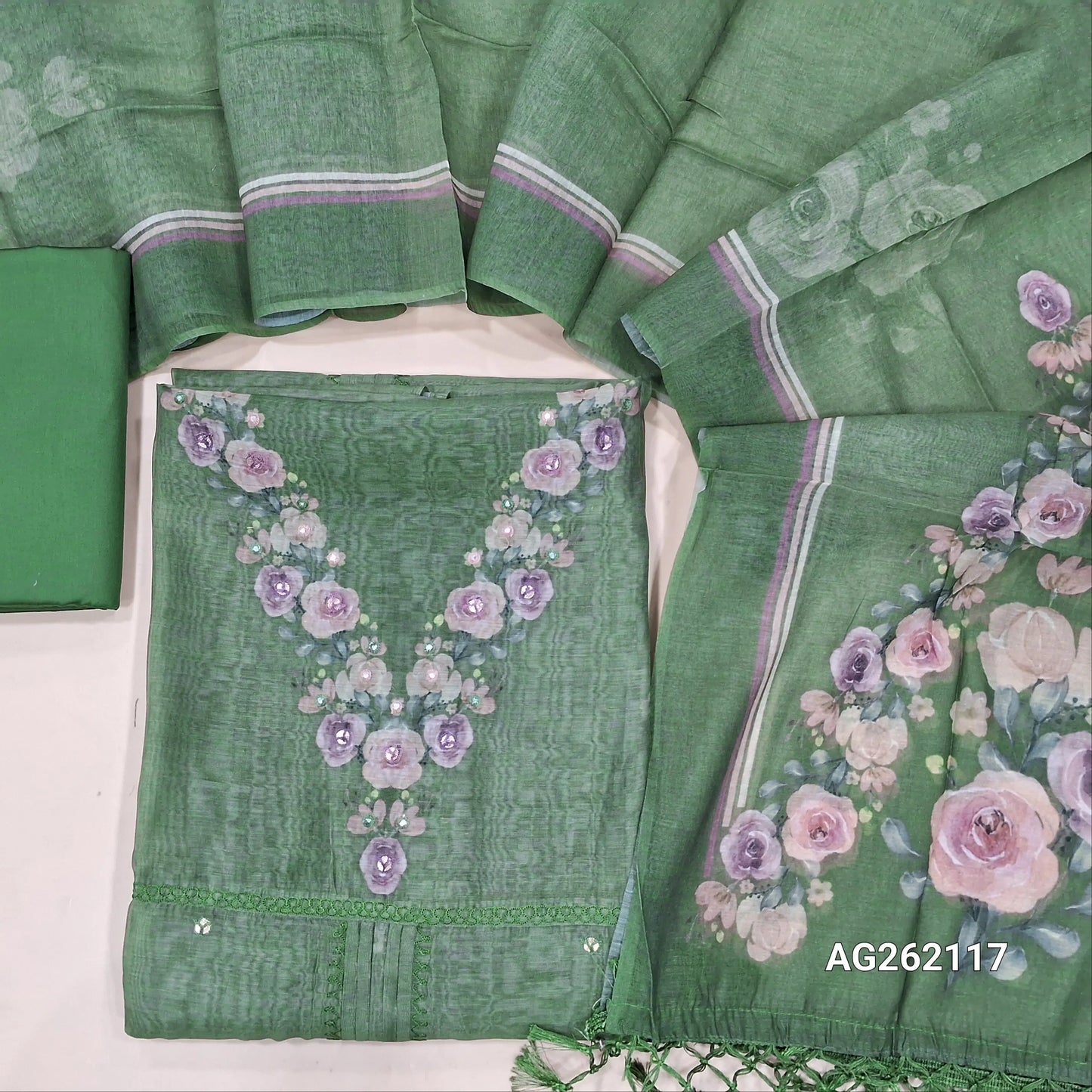 Designer sage green mul chanderi unstitched salwar material,digital printed and faux mirror yoke, pintex and thread work on middle,( soft,lining needed)silk cotton bottom,digital printed mul chanderi dupatta with fancy tassles. AG262117