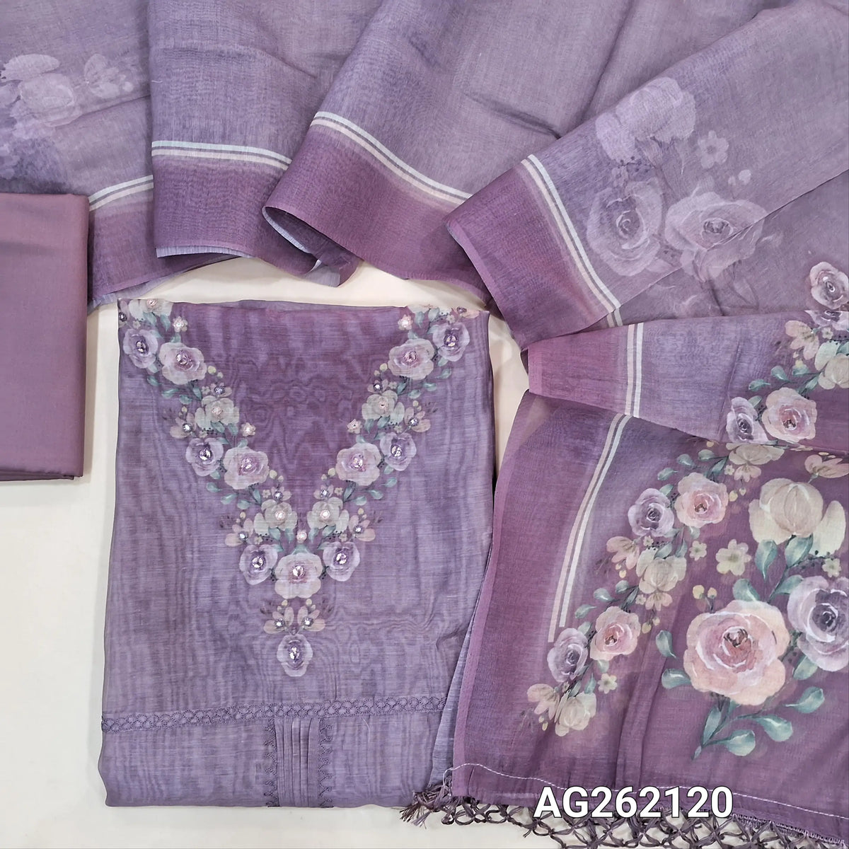 Designer onion pink mul chanderi unstitched salwar material,digital printed and faux mirror yoke, pintex and thread work on middle,( soft,lining needed)silk cotton bottom,digital printed mul chanderi dupatta with fancy tassles. AG262120
