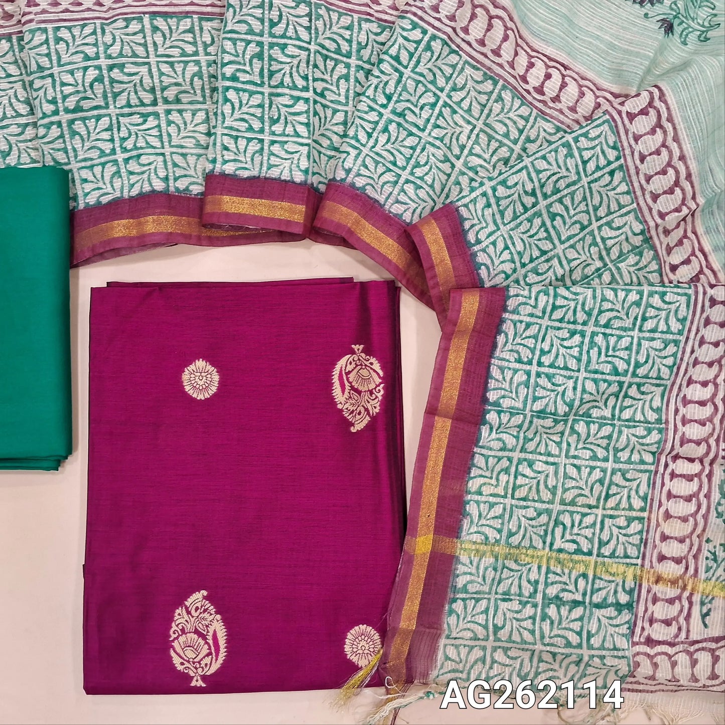 Rani pink benarasi silk cotton unstitched salwar material, thread woven buttas all over(Lining needed)turquoise blue spun cotton bottom,hand block printed pure kota cotton dupatta with tissue borders. AG262114