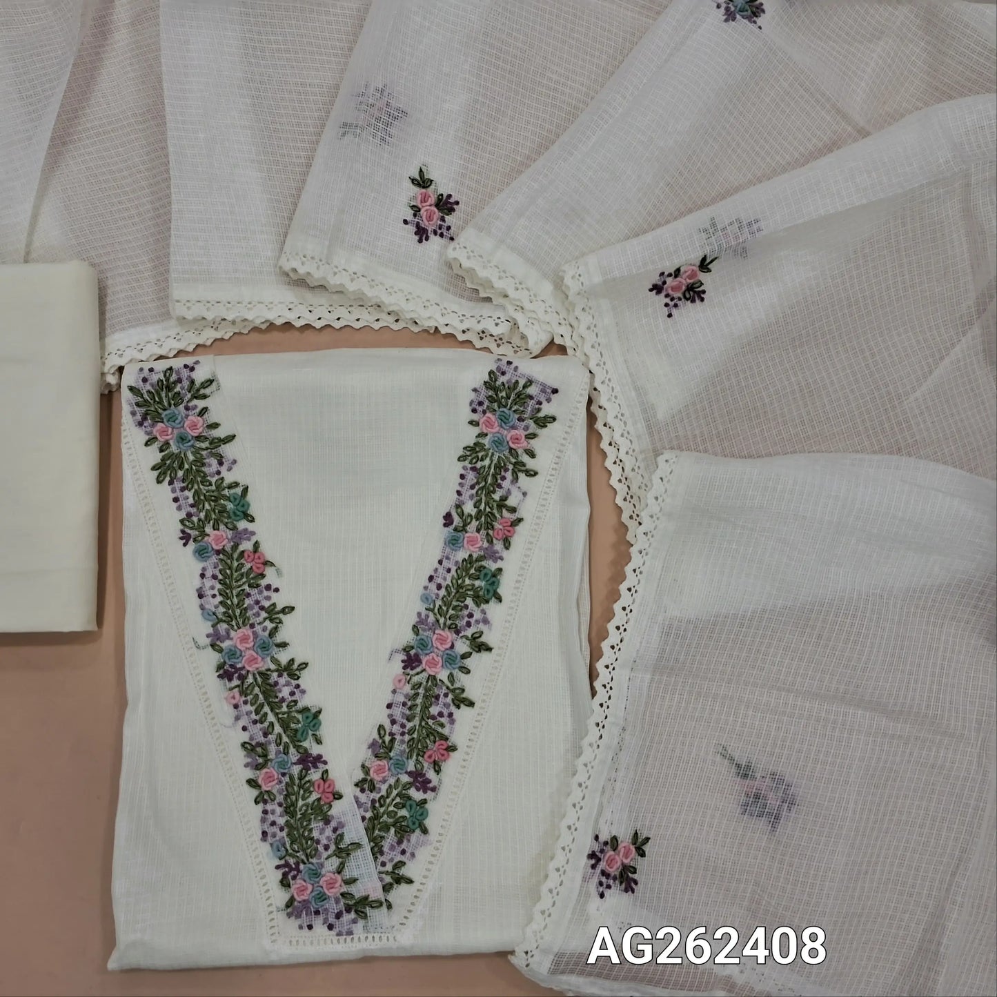 Designer white premium kota unstitched salwar material, V neckline with hand embroidery and sequins work (Thin, Lining Needed) matching cotton bottom, premium kota dupatta with hand embroidery. AG262408