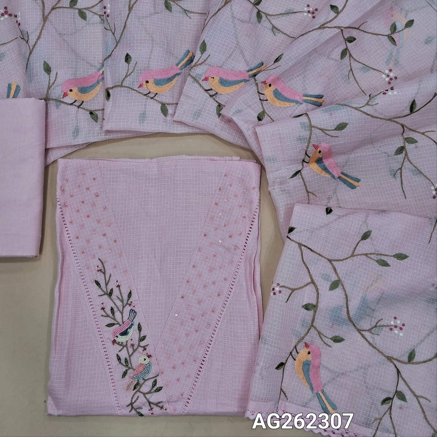 Designer pastel pink premium kota unstitched salwar material, V neck with bead and sequins detailing (Thin, Lining needed) matching cotton bottom, premium kota dupatta with rich thread embroidery all over and lace tapings. AG262307