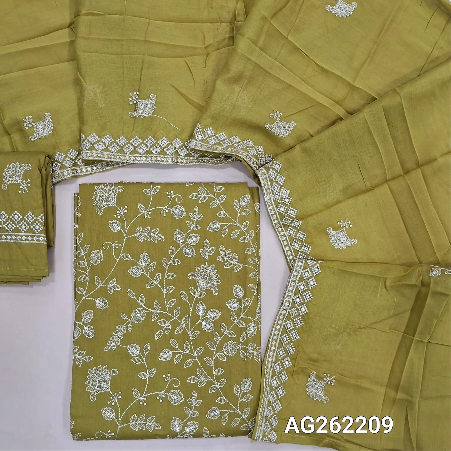 Light Mehandhi Yellow embroidered cotton unstitched salwar material, rich jaal embroidery all over (Lining Needed) matching embroidered cotton bottom, soft mul cotton embroidered dupatta. AG262209