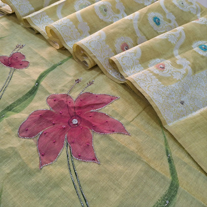 Pastel Yellow premium muga silk cotton unstitched salwar material, hand brush paint work on front with cut bead detailing (Lining Needed) matching santoon bottom, rich jamdani and meenakari woven muga silk cotton dupatta with cut bead work. AG262202
