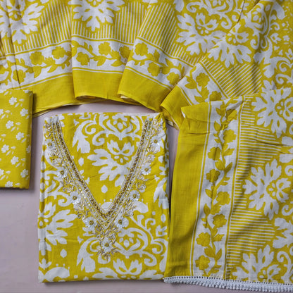 Mehandhi Yellow printed soft cotton unstitched salwar material (lining needed) v neck with zarodzi,faux mirror and cut bead work on front, printed cotton bottom, printed mul cotton dupatta with lace tapping. FB261511